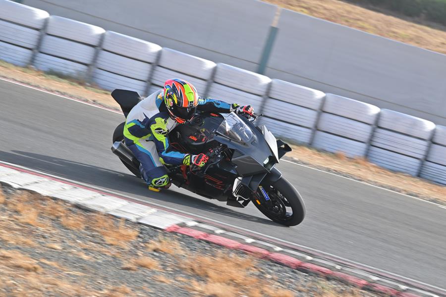 2026-on KTM 990 RCR ripping into a corner on track
