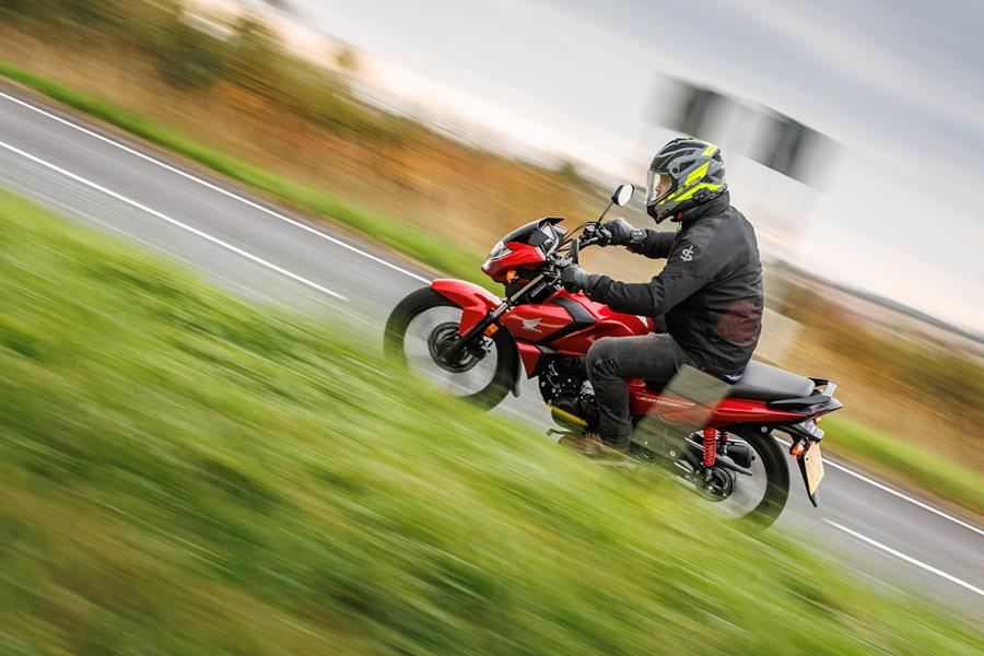 2026-on Honda CB125F riding on a country road