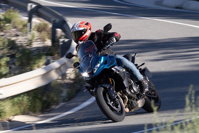 2026-on Triumph Tiger Sport 660, leaning right around a turn