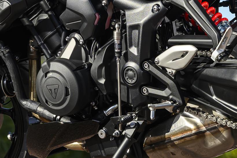 2026 Triumph Trident 660, close up of quickshifter and accessory engine case covers
