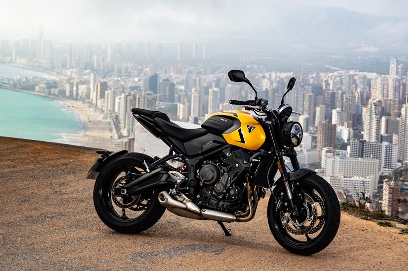 2026 Triumph Trident 660, parked with a city view in the background