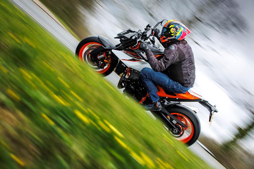 2026-on KTM 990 Duke R leaning into a corner