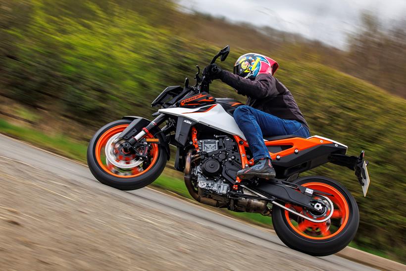 2026-on KTM 990 Duke R leaning into a right hand bend