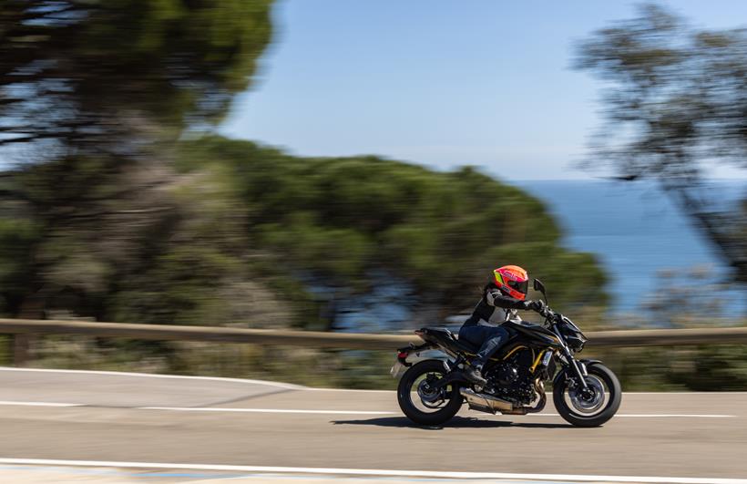 2026-on Kawasaki Z650S leaning into a mountain bend