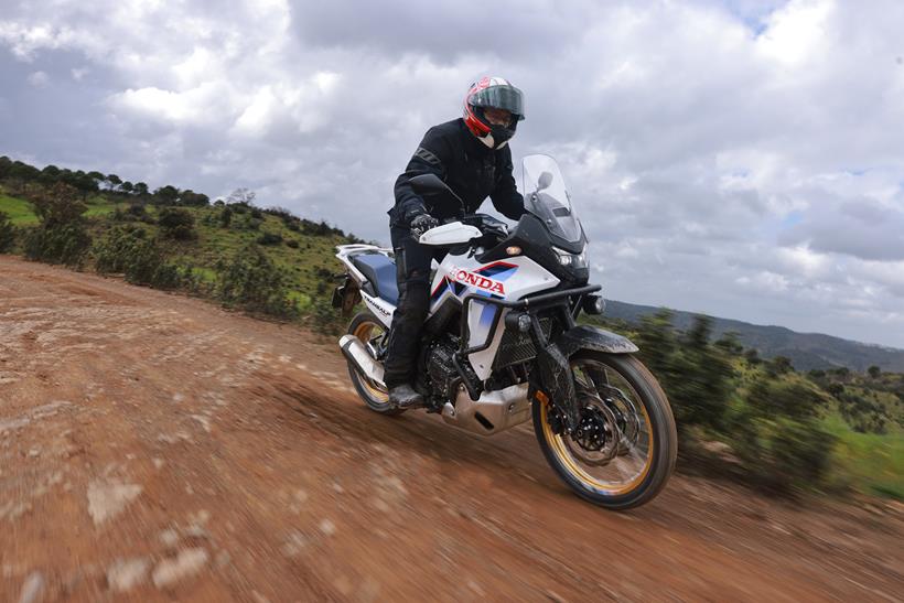 2026-on Honda XL750 Transalp E-Clutch on a dirt road