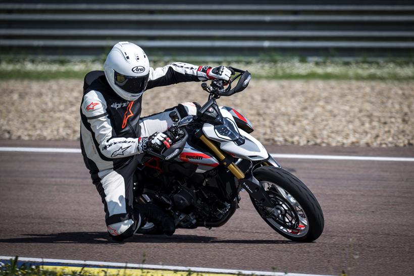 2026-on Ducati Hypermotard V2 leaning into a corner