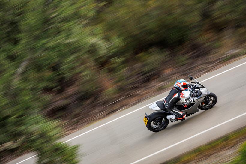 2026-on Norton Manx R Signature looking down on the bike as it passes by