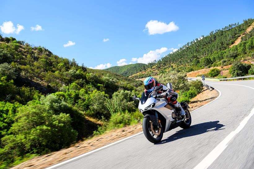 2026-on Norton Manx R Signature riding the Norton on a country road