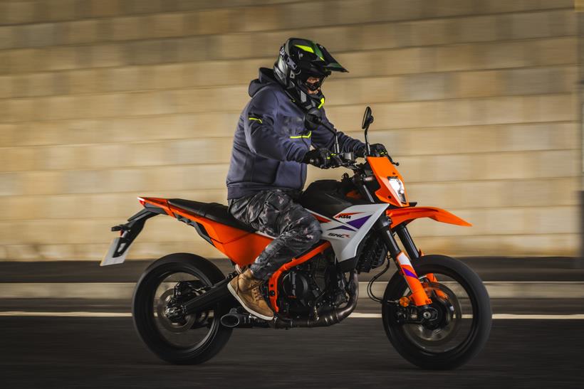 2025-on KTM 390 SMC-R riding under a pass