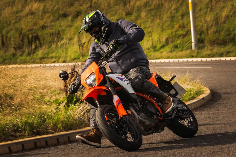 KTM 390 SMC-R, leaning around a turn