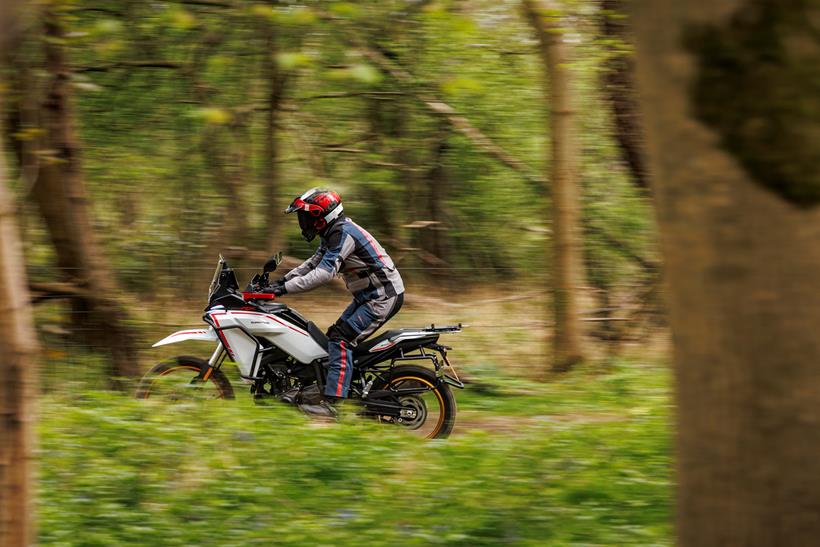 2026-on QJMotor SRT 450 RX down a trail