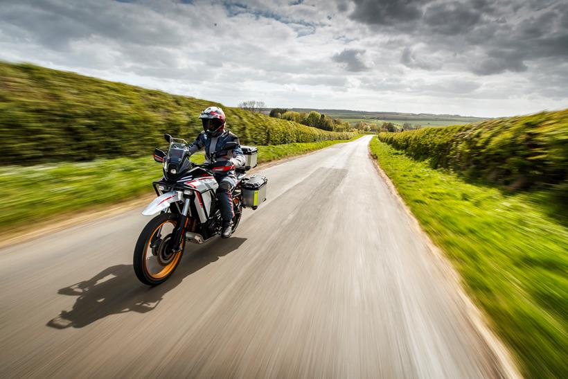 2026-on QJMotor SRT 450 RX riding down the road
