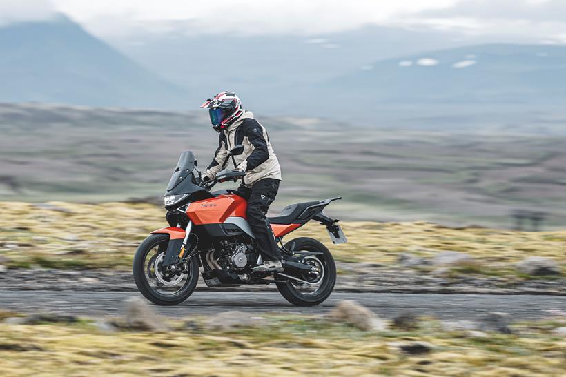 2027-on Norton Atlas Apex standing up on the bike off road